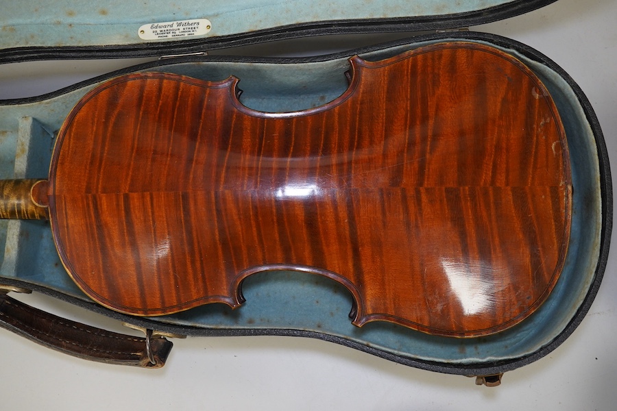 A late 19th century French Chipot-Vuillaume violin, with Edward Withers case, back measures 36cm.